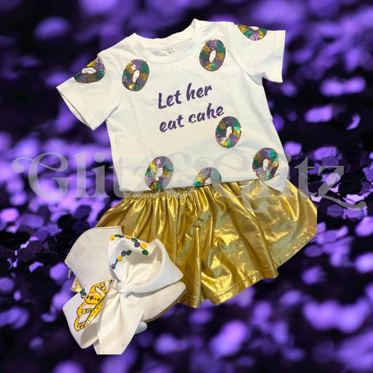 A girl's "Let Her Eat Cake Tee" and skirt by SeersuckerJOEY LLC with the words let's eat cake.