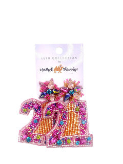 A pair of Beaded Earrings - 21 by Camel Threads with the number 21 on them.