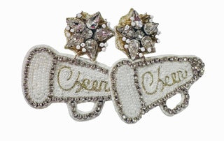 A pair of Beaded Earrings - Cheer by Camel Threads with the words crown queen on them.